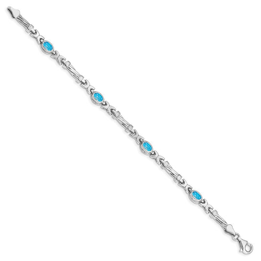 10k White Gold Oval Blue Topaz Bezel 4-Stone 7.25 inch Bracelet