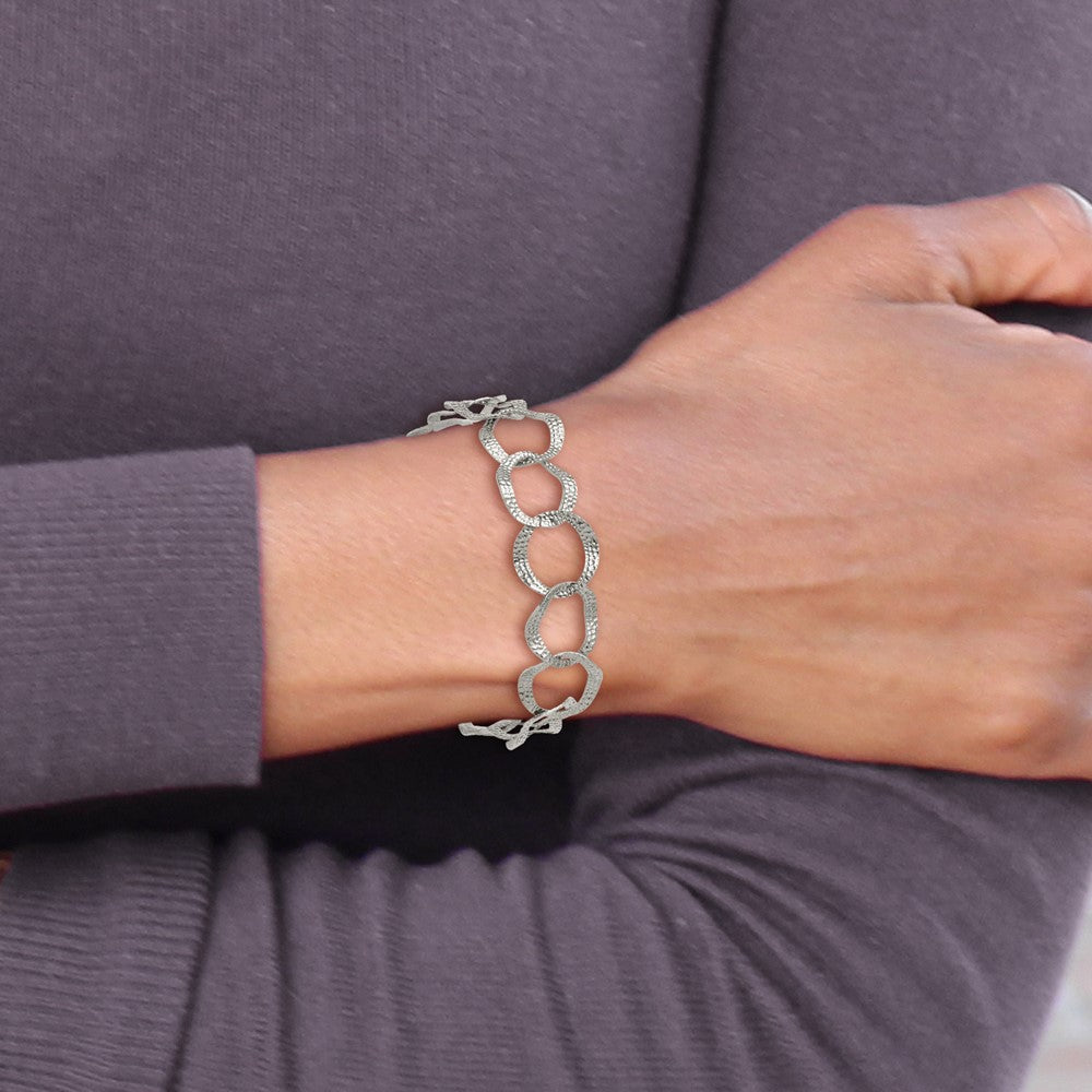 Chisel Stainless Steel Polished and Textured Open Circles 7.25 inch Plus a 1.5 inch Extension Bracelet