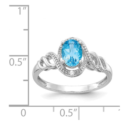 10k White Gold 7x5mm Oval December/ Light Swiss Blue Topaz and Diamond Size 7 Ring