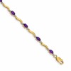 10k Diamond and Oval Amethyst Wavy Link 7 inch Bracelet
