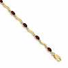 10k Diamond and Oval Garnet Wavy Link 7 inch Bracelet