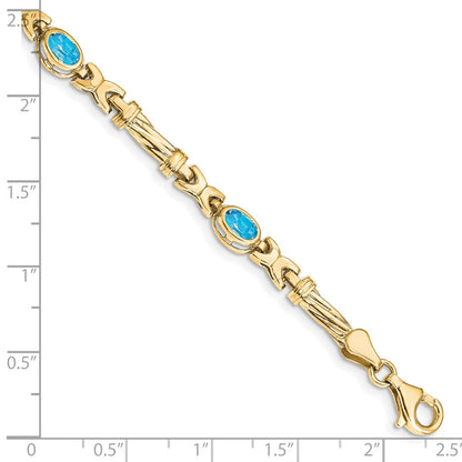 10k Oval Blue Topaz Bezel 4-Stone 7.25 inch Bracelet