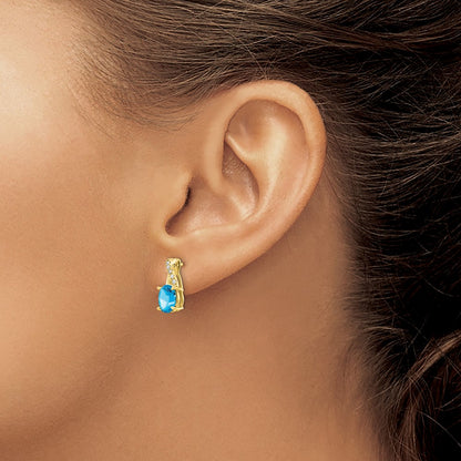 10k 7x5mm Oval December/ Blue Topaz and Diamond Post Earrings