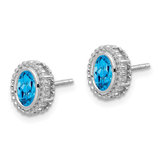 10k White Gold 6x4mm Oval Blue Topaz Post Earrings