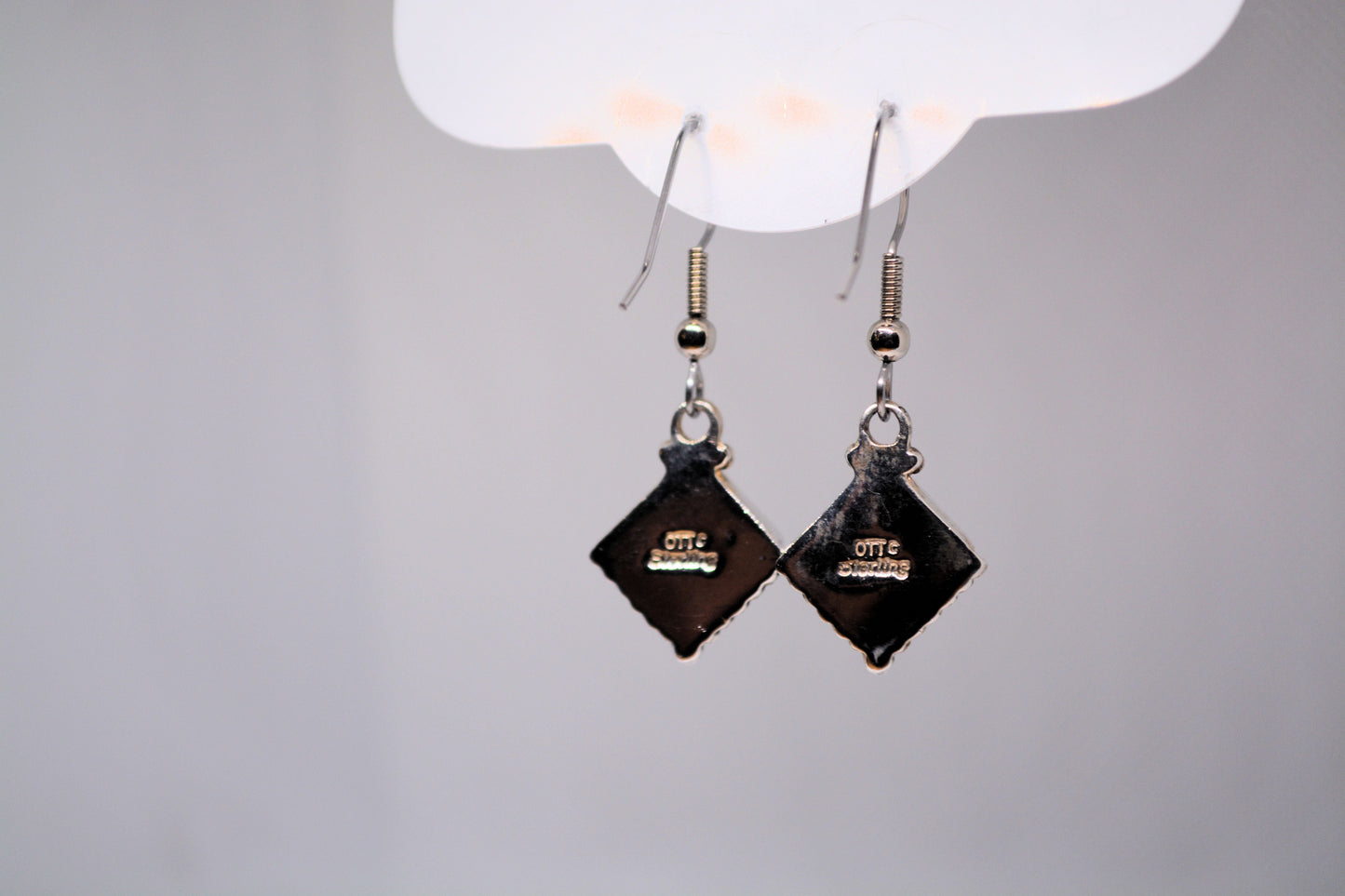 Turquoise square drops