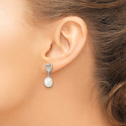 Sterling Silver Rhodium-plated 7-8mm White Rice Freshwater Pearl and CZ Heart Post Dangle Earrings