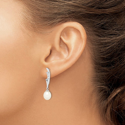 Sterling Silver Rhodium-plated 7-8mm White Rice Freshwater Cultured Pearl and CZ Post Dangle Earrings