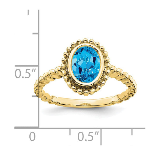 10k 8x6mm Oval Blue Topaz Ring